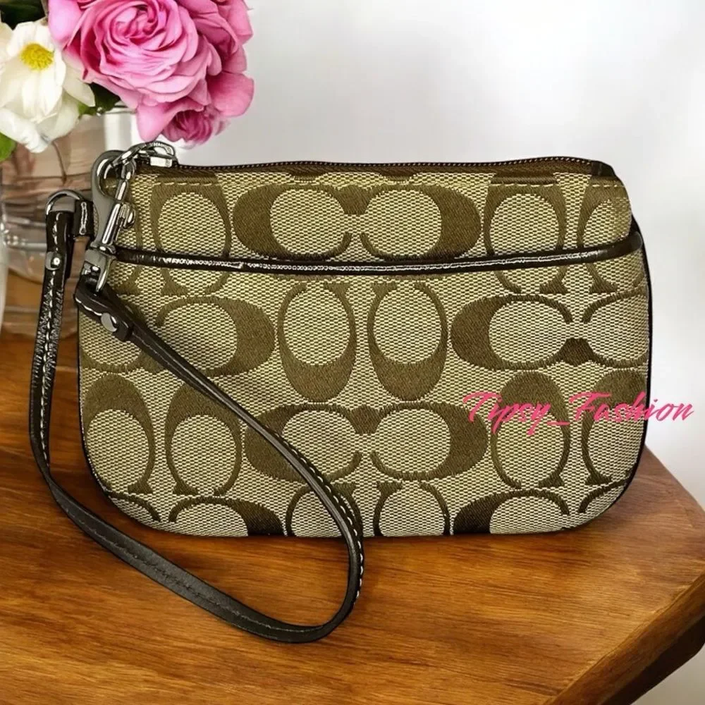 Coach Signature Wristlet with Purple Interior Classic Style, Everyday Chic